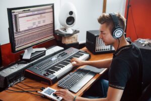 sound engineer in headphones working and mixing mu 2022 02 01 22 38 34 utc 1
